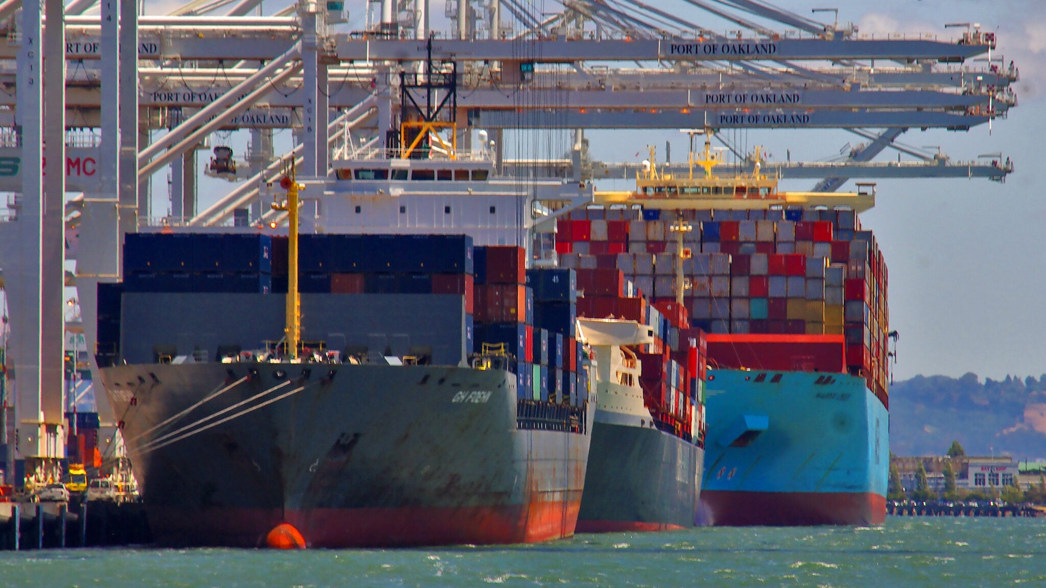 Container ships docked at the Port of Oakland