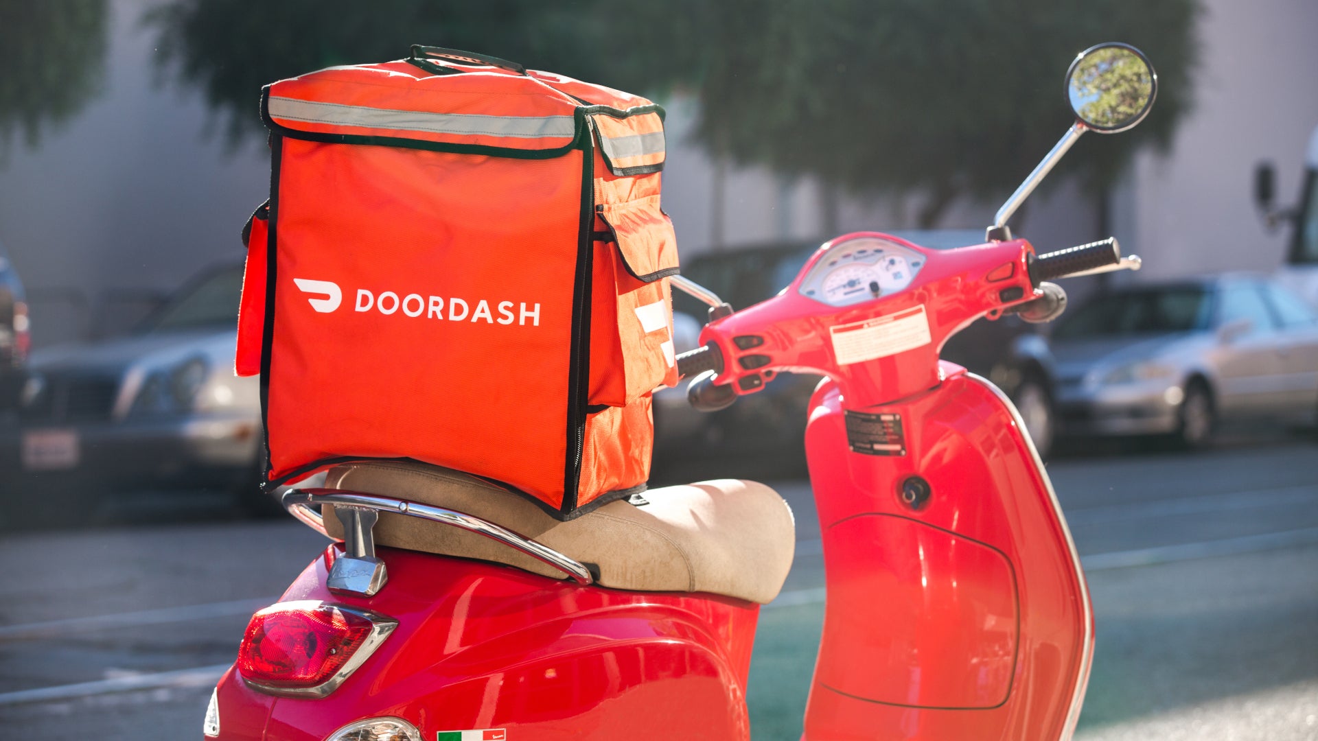 DoorDash scooter, company earnings released