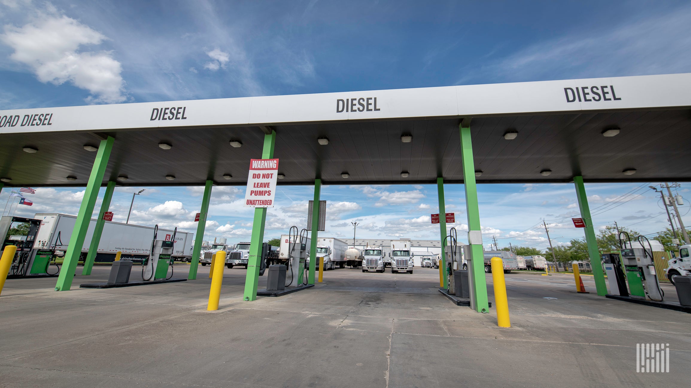 Diesel fuel pumps, with the word diesel above them, at a truck stop