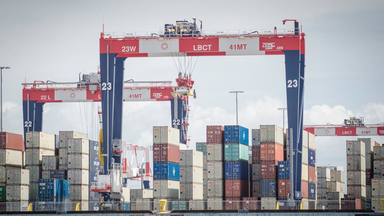 Cranes moving containers at Port of Long Beach