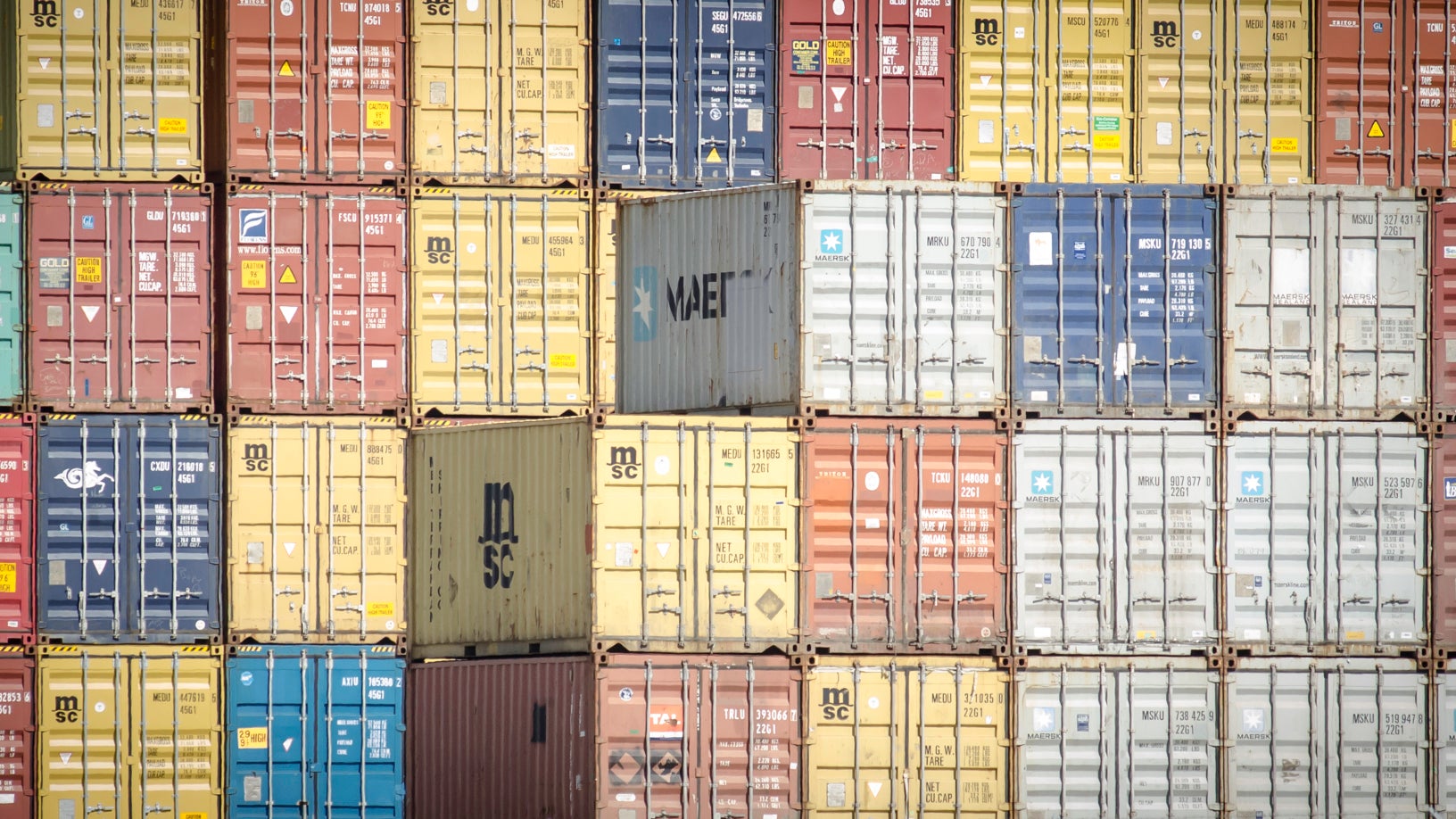 photo of containers piled up in Los Angeles/Long Beach port complex