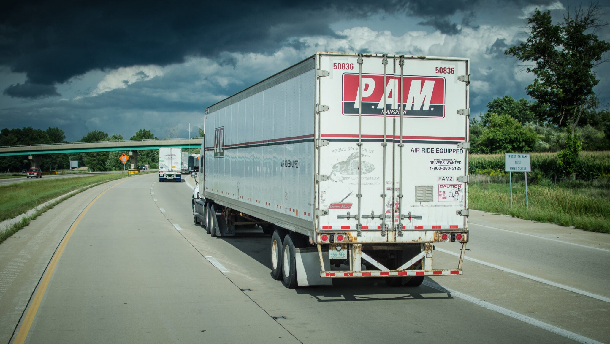 A PAM Transport tractor-trailer.