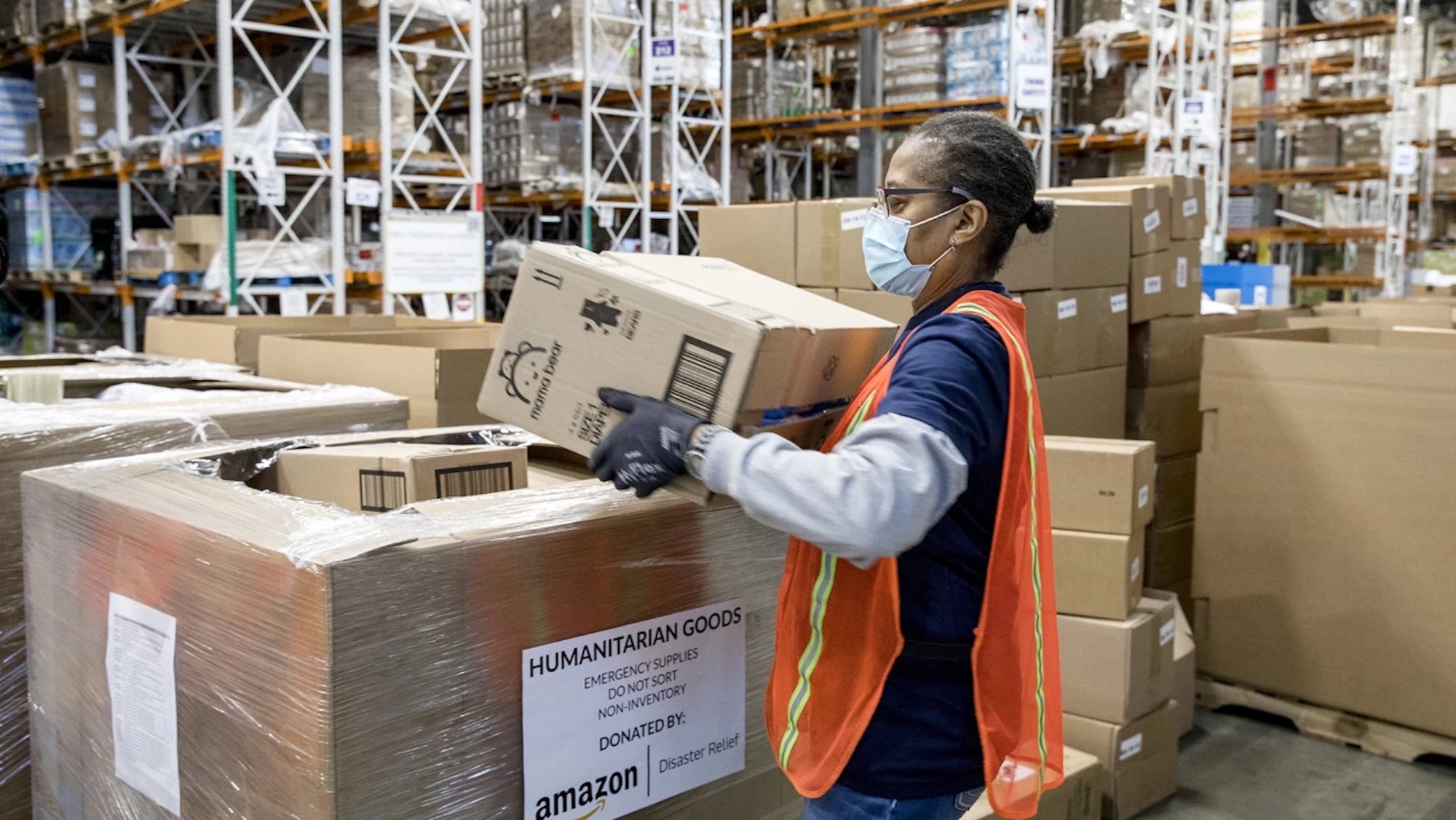 A warehouse worker at Amazon's disaster relief facility