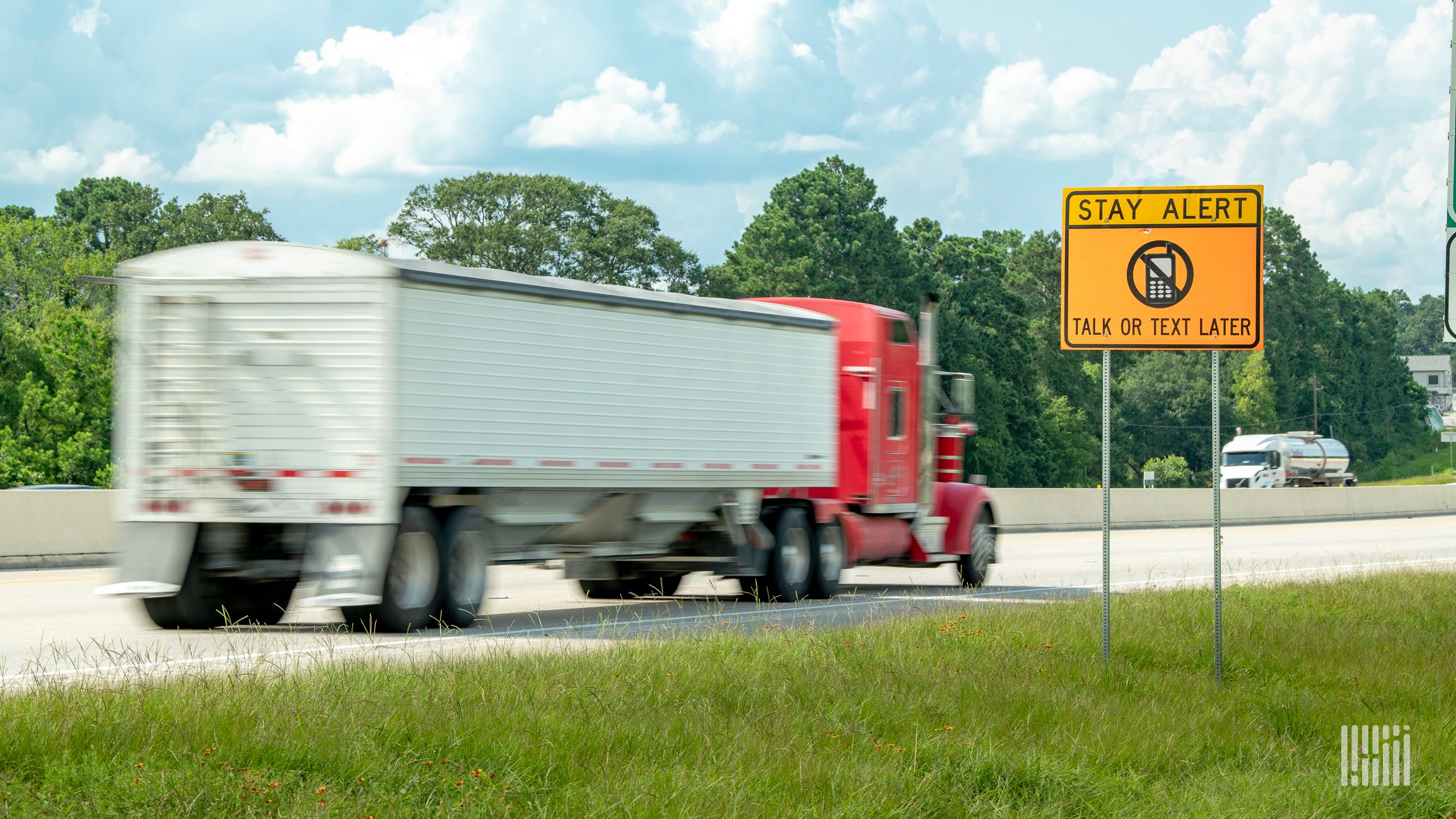 hopper truck hauling grain