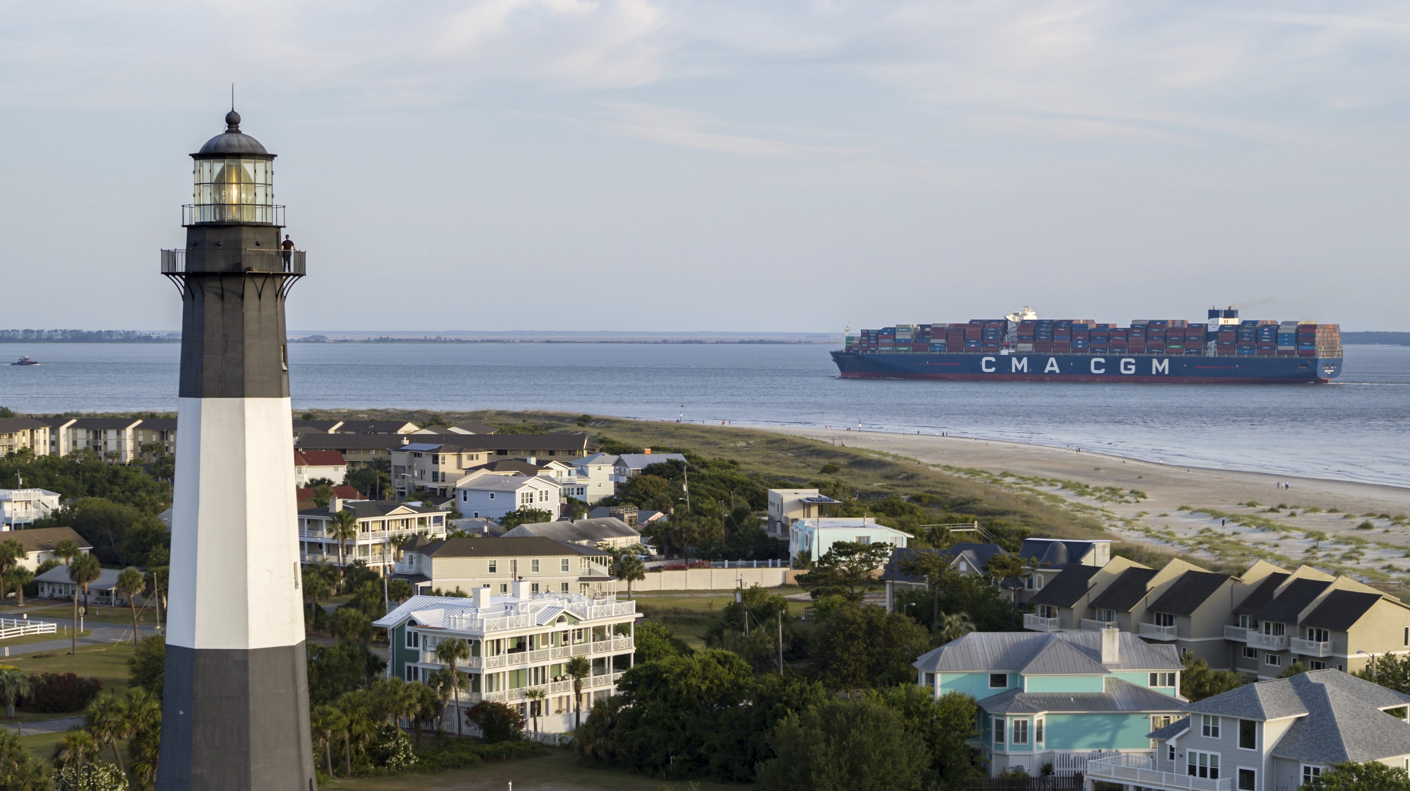 photo of a container ship waiting offshore