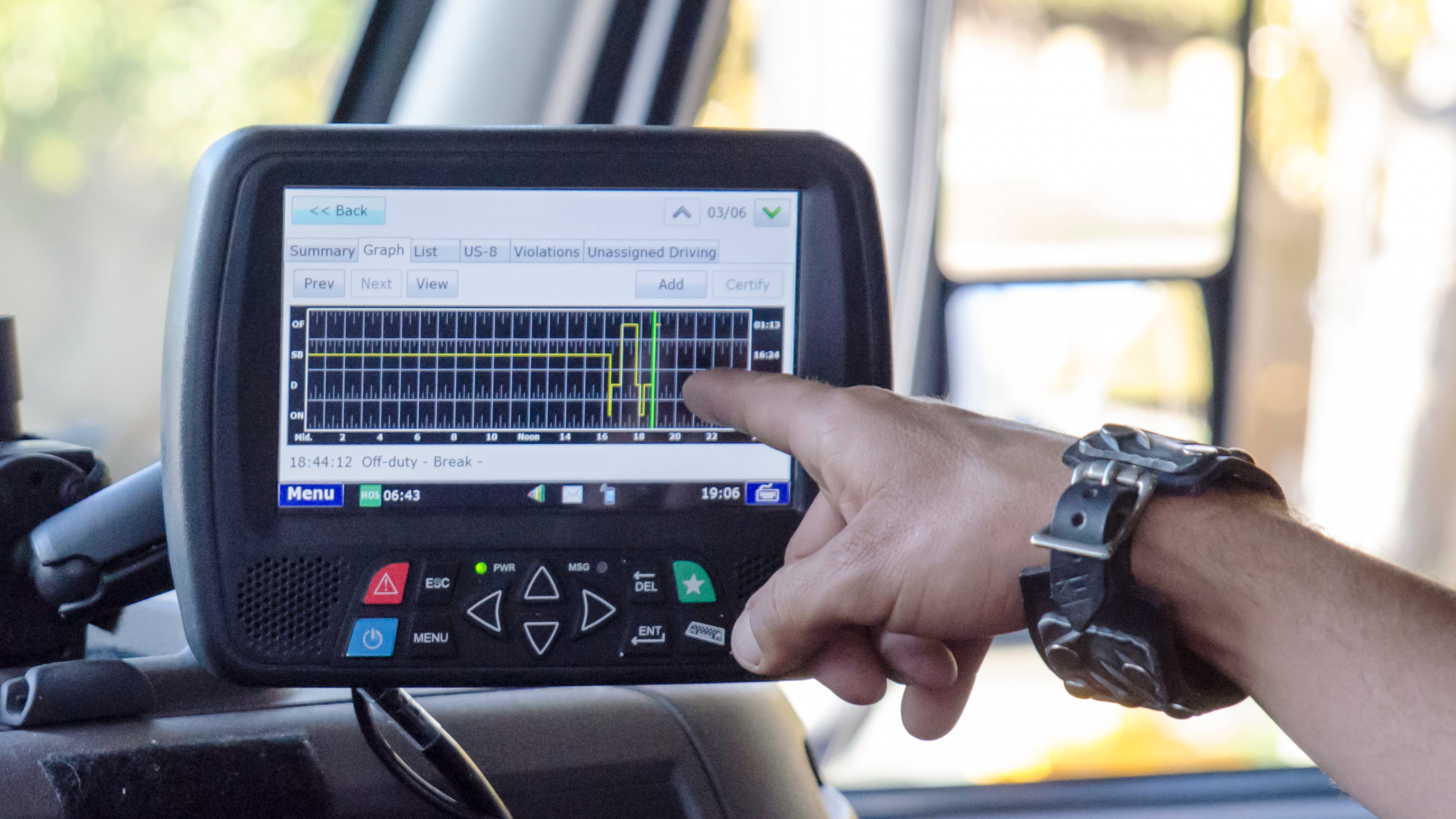 Electronic logging device in truck cab