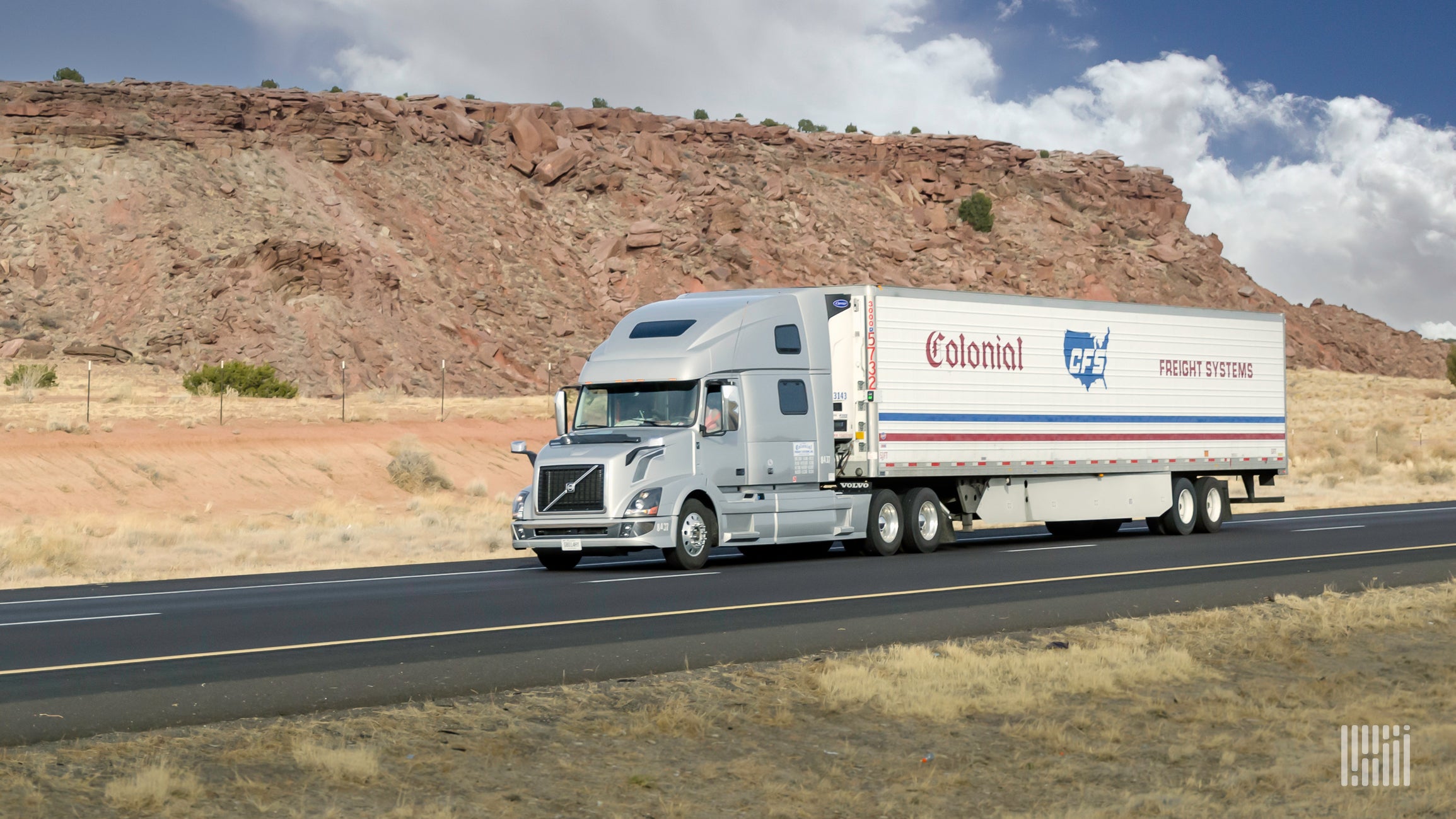 A Colonial Freight Systems trailer being pulled on the highway