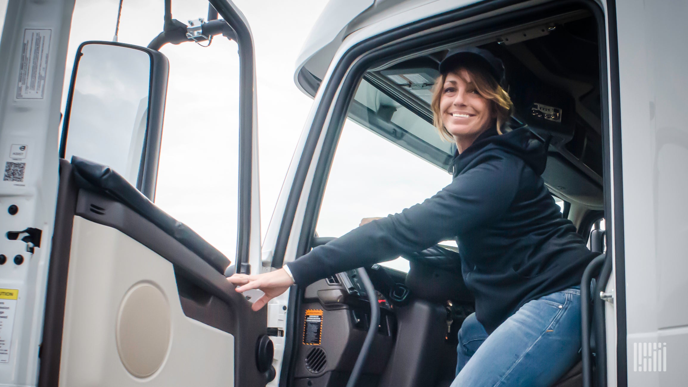 Female truck driver in truck