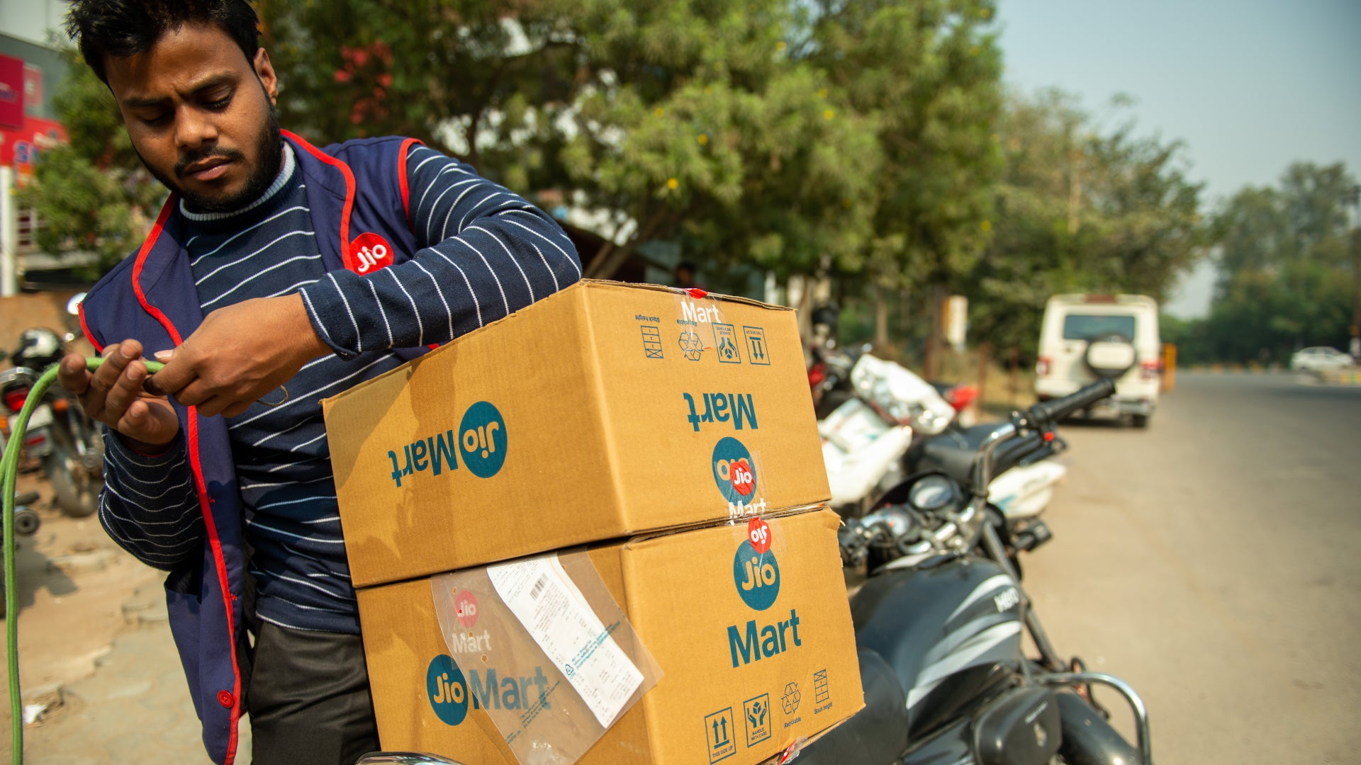 JioMart Jio Platforms grocery delivery courier