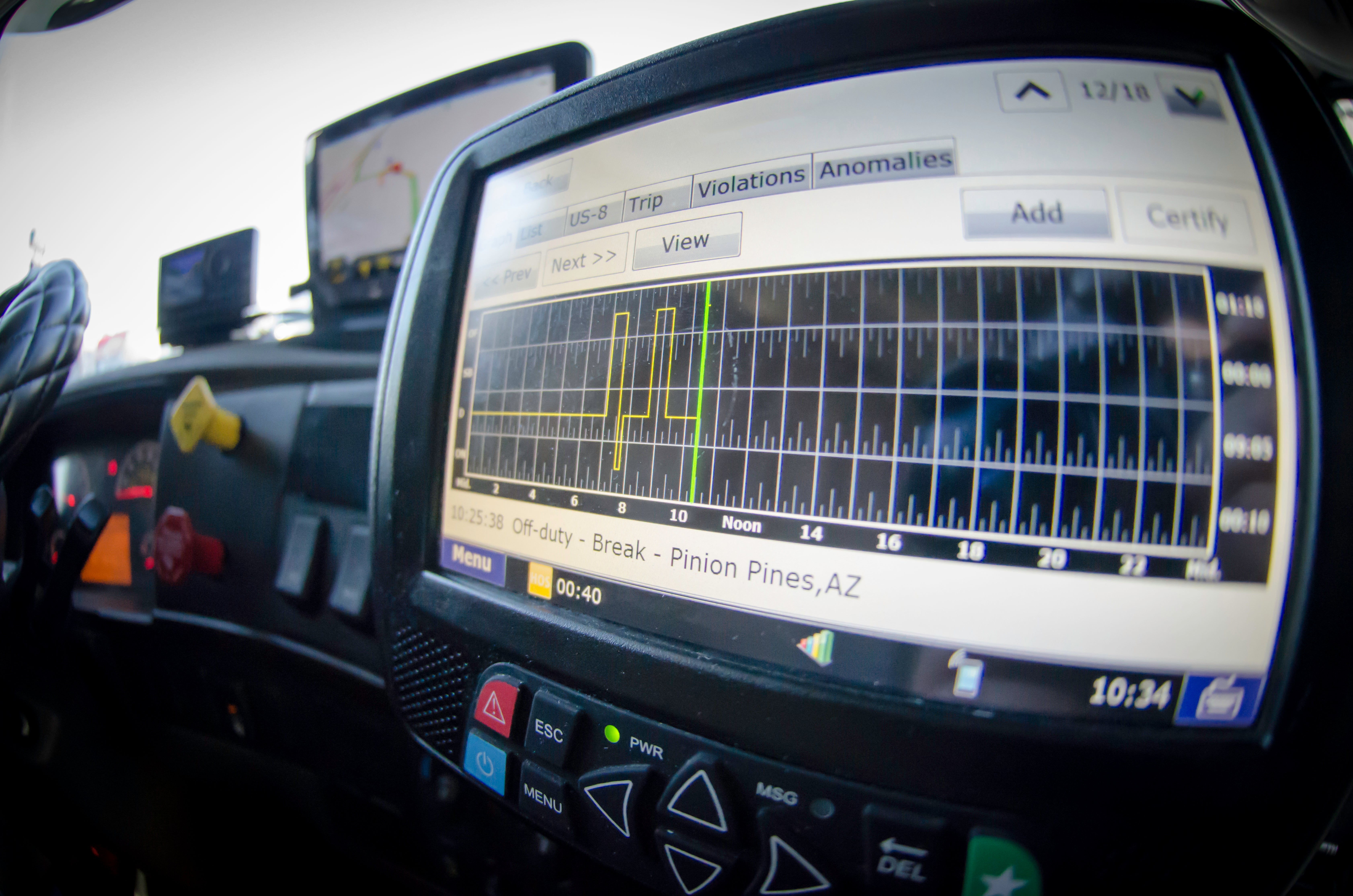 Truck cab electronic logging device.