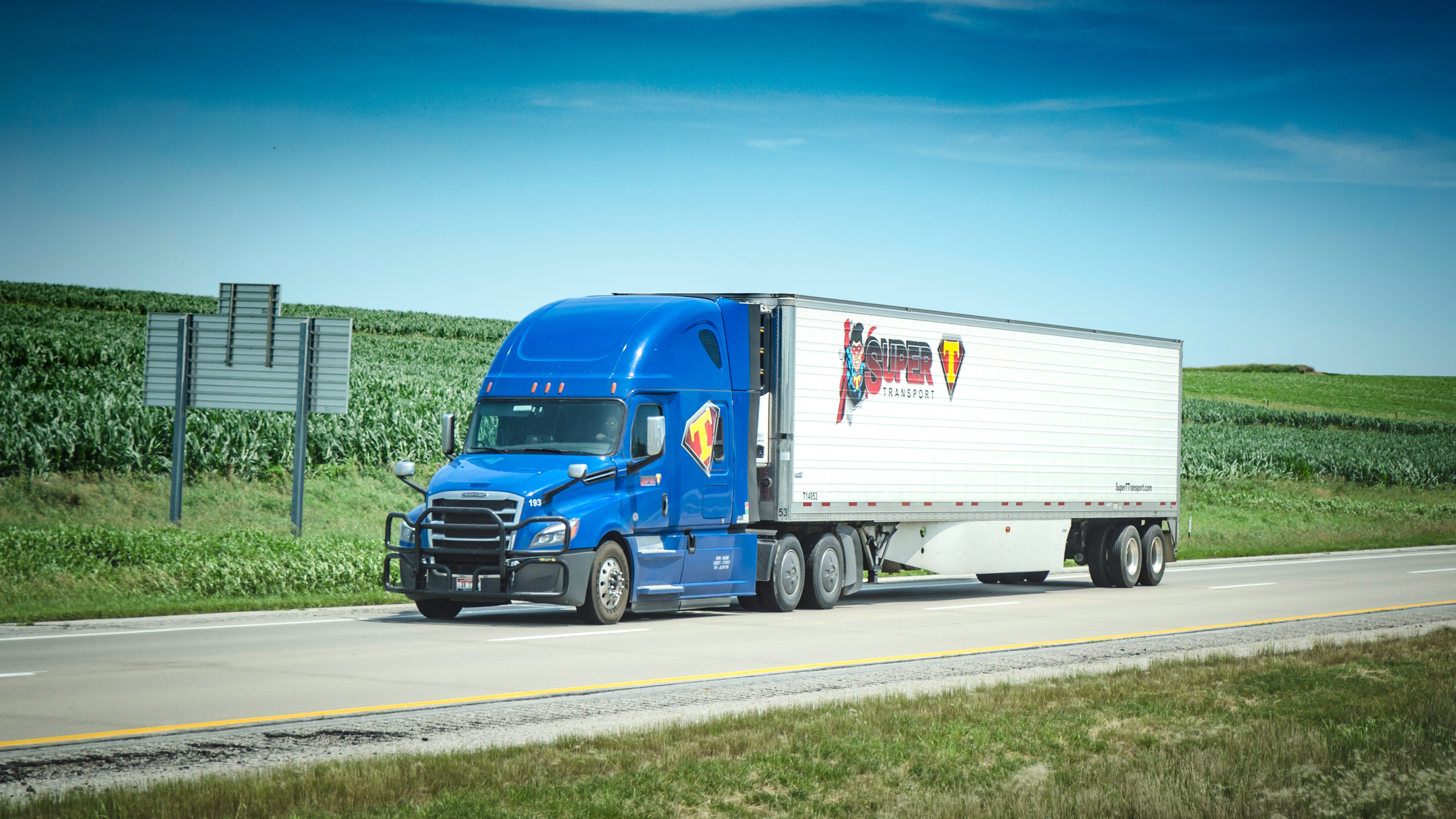 A Super T Transport tractor-trailer on the highway