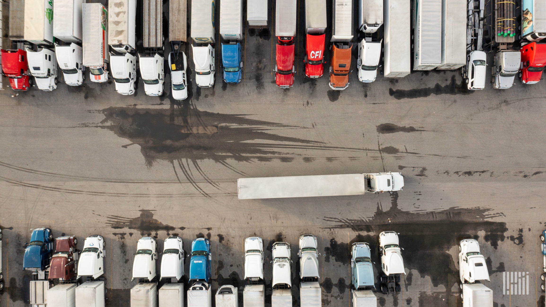 Trucks parked at truck stop.