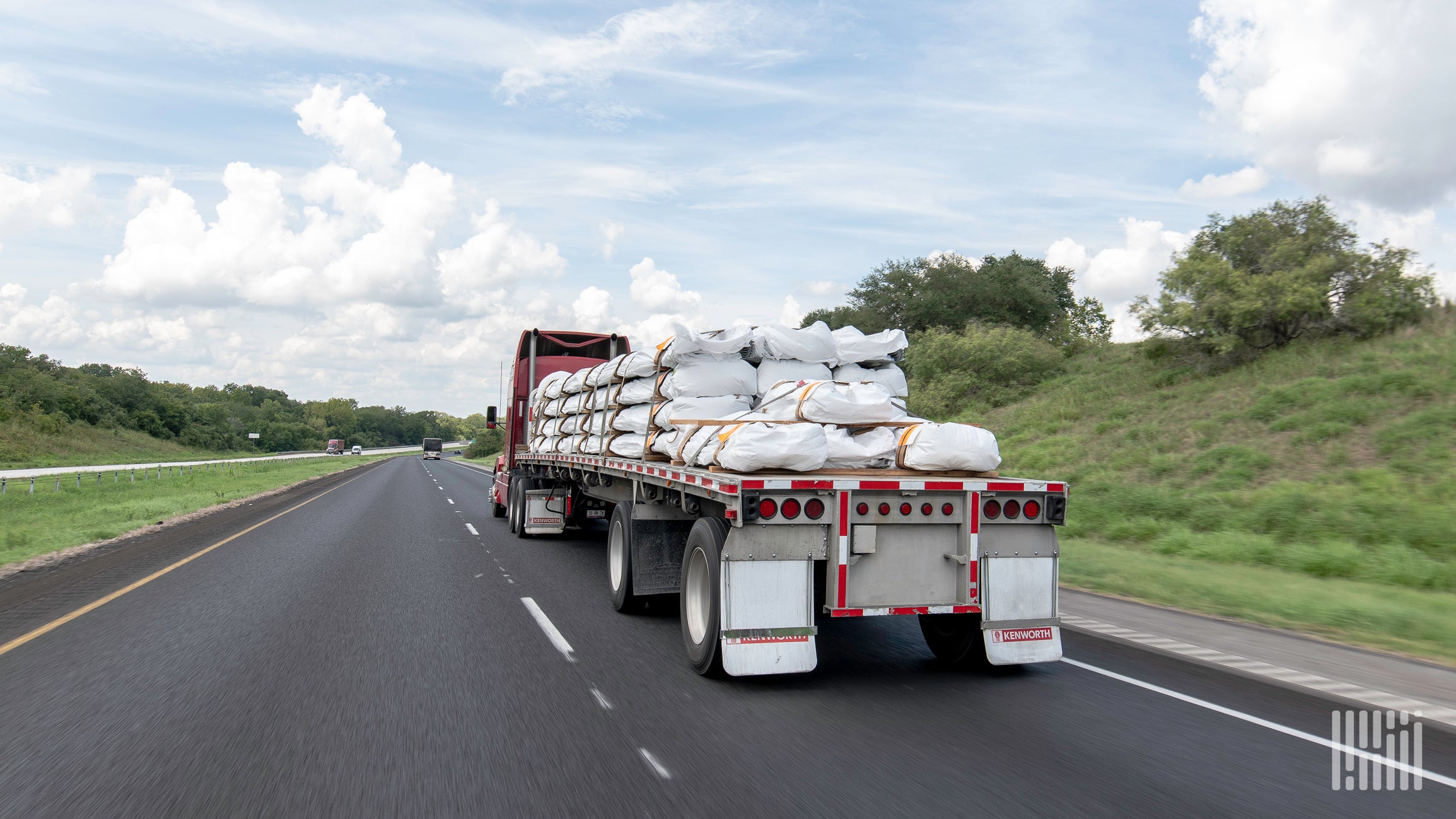 A flatbed rig on the highway