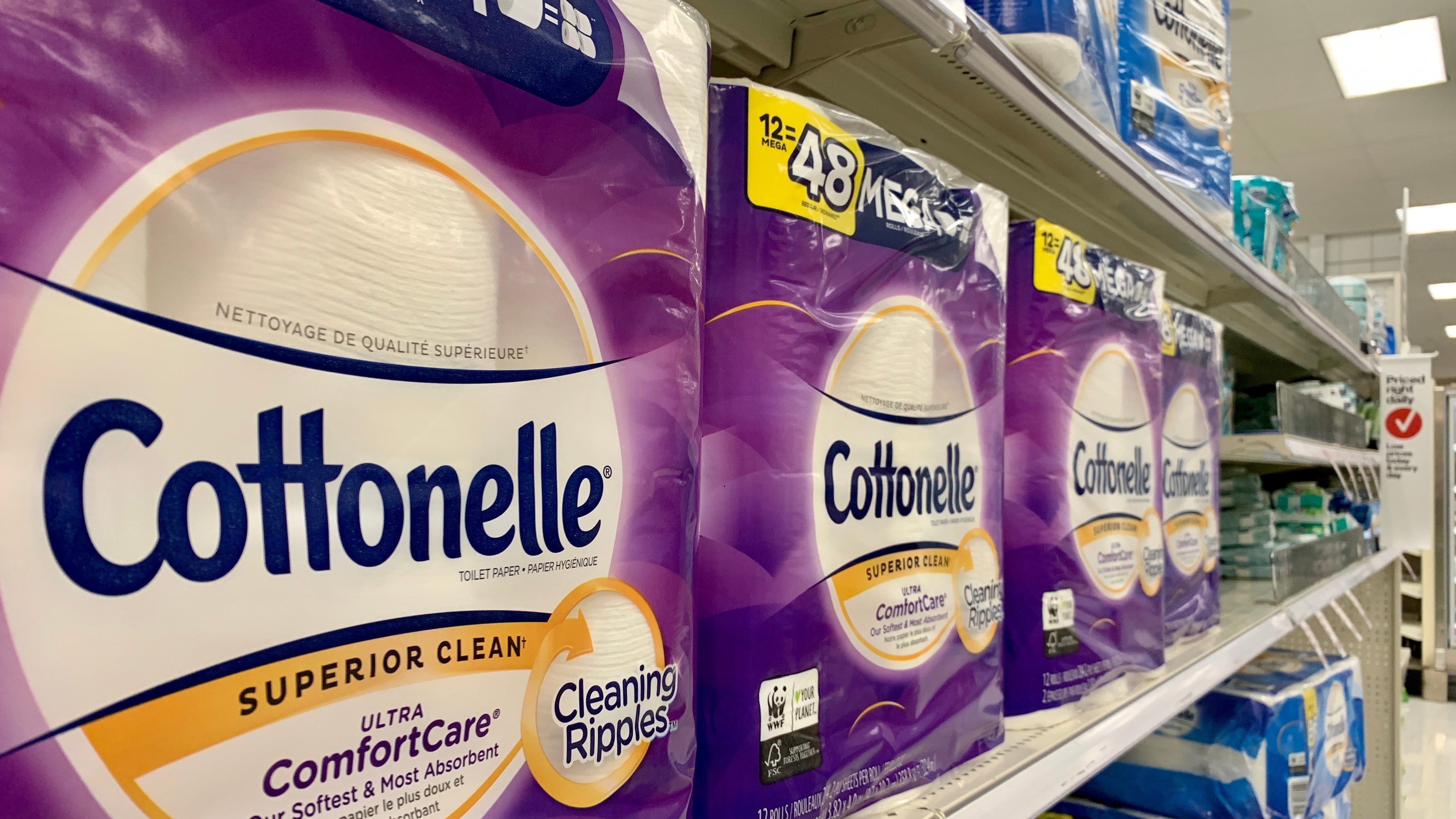 A close up view of Cottonelle packages on a store shelf.