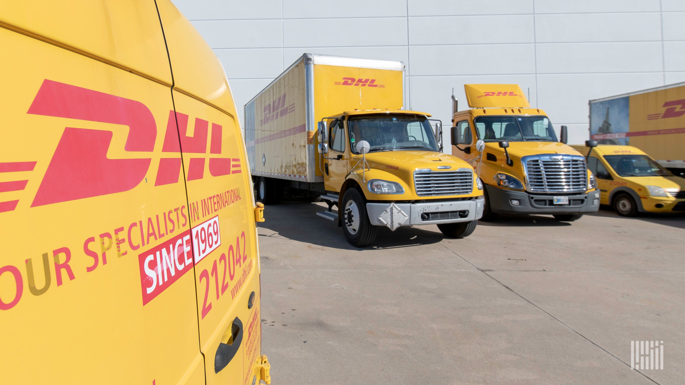 DHL express delivery trucks