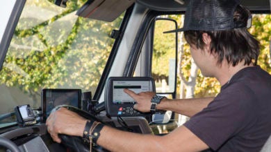 Truck driver using an electronic logging device.