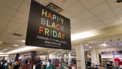 Black Friday signs hanging from store ceiling