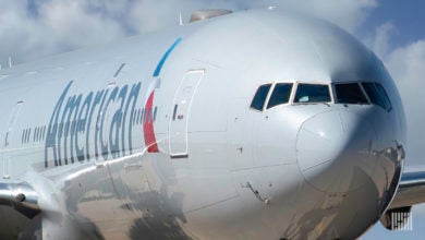 A close from the front of a white American Airlines jetliner.