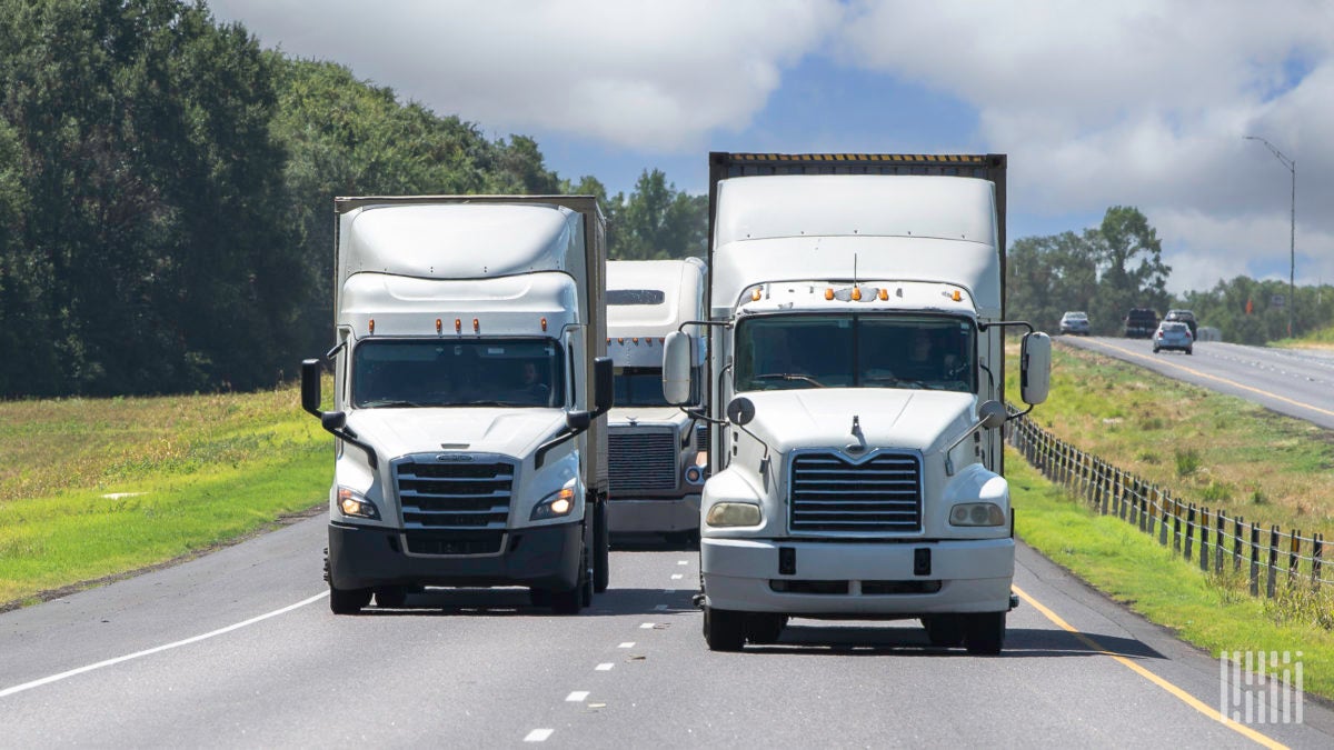 Multiple trucks on the highway