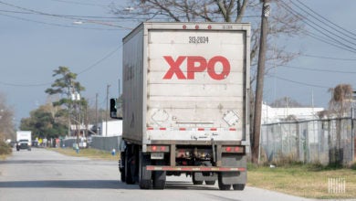 XPO truck with liftgate on road