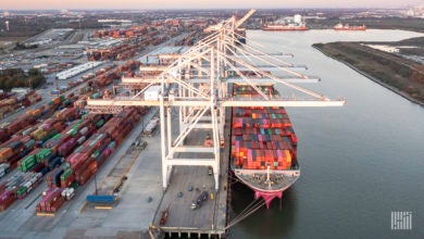 a picture of container imports unloading in Houston