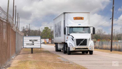 Yellow truck leaving a Houston teminal.