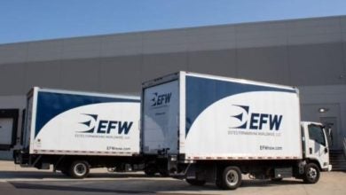 EFW cartage trucks at a warehouse