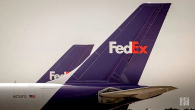 Close up of purple tail on a FedEx jet.