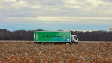 Green truck in a field