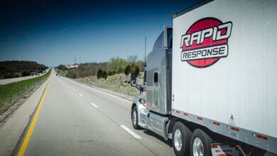 A Rapid Response tractor-trailer on a highway