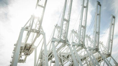 a photo of cranes at the ports of LA/LB