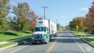 An Old Dominion tractor-trailer on a road