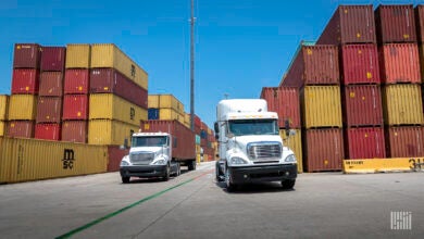 Trucks pulling containers from a port