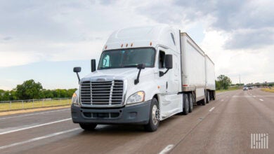 A white unidentified LTL rig on highway