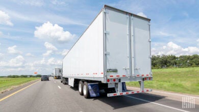 A view of tractor-trailers on the highway