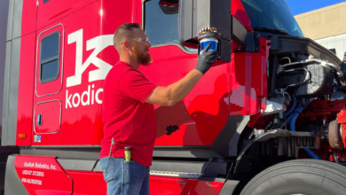 Inspector with red Kodiak truck