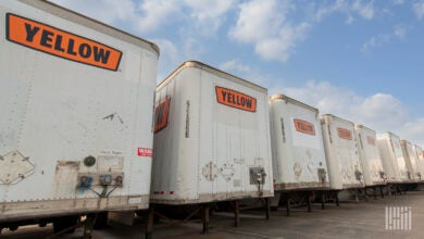 Yellow trailers parked at a Houston terminal