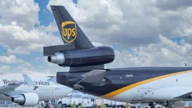 Brown tail of a UPS plane, close up photo.