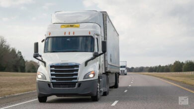 A J.B. Hunt tractor-trailer on a highway