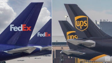 Purple and brown tails of FedEx and UPS planes juxtaposed.