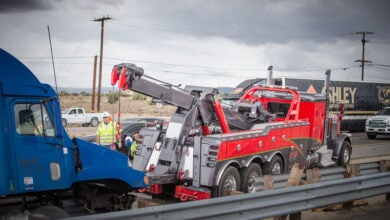 Truck being towed from accident scene