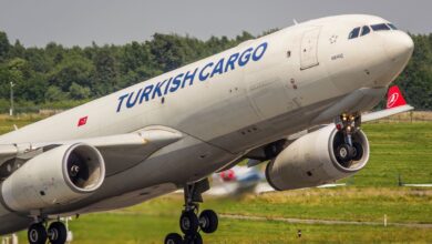 Close of a Turkish Cargo jet as the nose lifts up on takeoff.