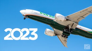 A view of a plane flying overhead with a 2023 year imposed in the frame for the year-in-review story.