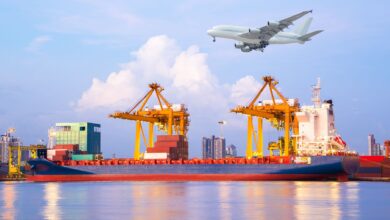 CGI image of a plane flying over a container port.