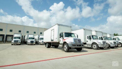 Box trucks at a warehouse