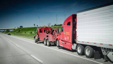 Truck being towed