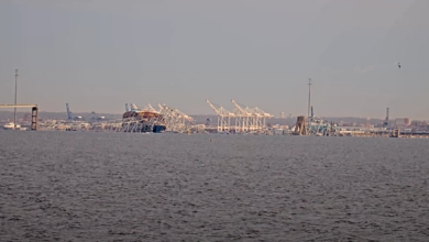 The collapsed section of the Francis Scott Key Bridge in Baltimore is seen more clearly after daybreak. (Photo: StreamTime Live/YouTube)