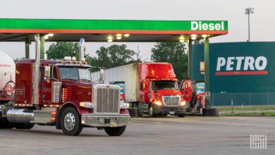 Trucks filling up with diesel fuel.