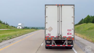 A rearview of a trailer on a highway