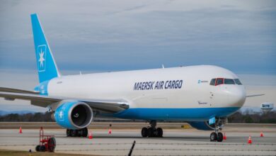 A light-blue tailed Maersk Air Cargo jet on the ground.